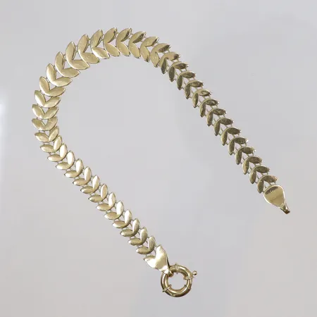 Armband bladmönster längd 18,5 bredd 7-10mm, 18K 9,4g Vikt: 9,4 g