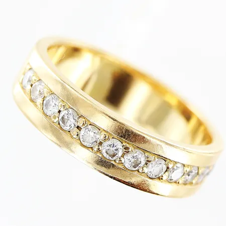 Ring Schalins diamanter 12st totalt 0,48ctv enligt gravyr stl:19 bredd 6mm 18K. Vikt: 8 g