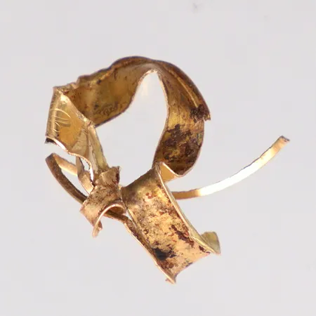 Defekt guld från en ring 18k 1,2gr  Vikt: 1,2 g