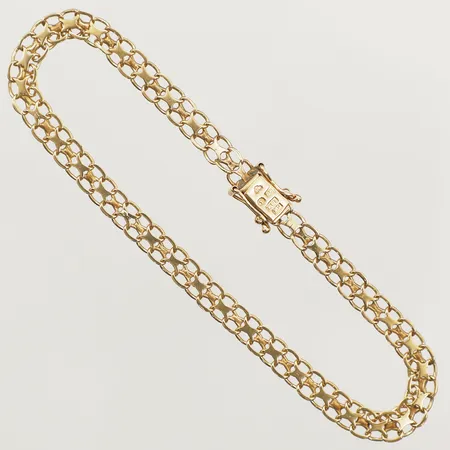 Armband X-länk längd 19,5cm bredd 4,8mm år 1962 18K Vikt: 6,1 g