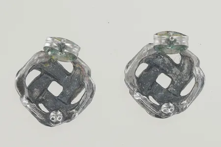 Ett par örhängen bredd 14 mm metall