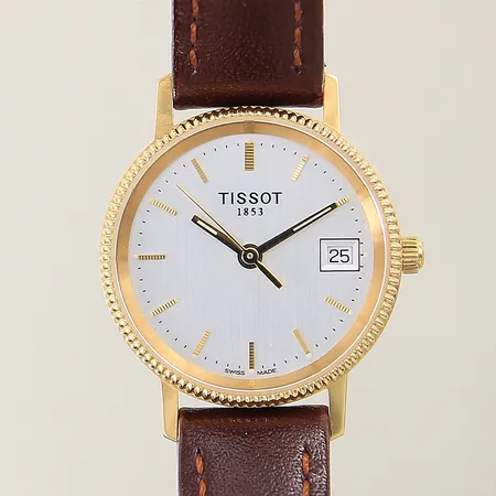 Damur Tissot 18K quartz Ø24mm numrerad H635330 datum safirglas brunt läderband ej original doubléspänne behov av batteribyte gravyr box
