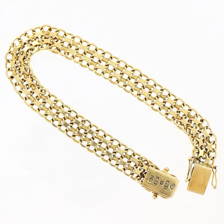 Armband X-länk längd 19cm, bredd 9mm, 18K Vikt: 16,2 g