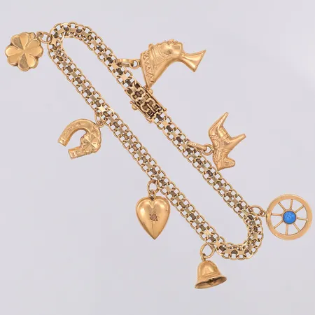 Armband X-länk 19cm bredd 5mm 7 berlocker, sliten pärla i berlock, 18K Vikt: 12,7 g