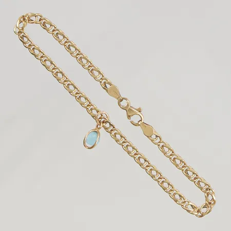 Armband med en berlock 18,5cm bredd 3,5mm 18K 3,8g.