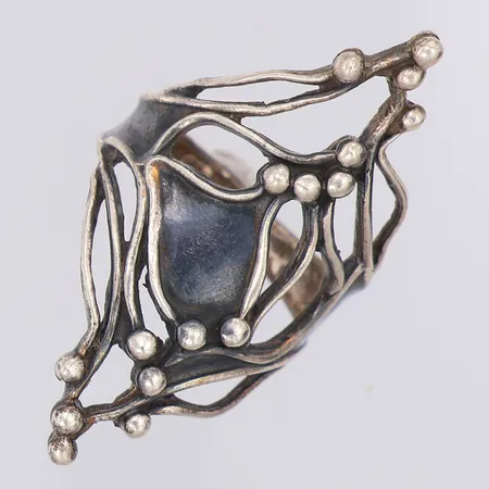Ring genombrutet mönster stl:16½ bredd 36mm, silver 925/1000 Vikt: 5,1 g