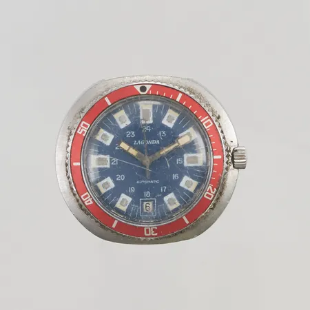 Herrur Lagonda, automatisk, boettnr: 3964, repigt glas, saknar band, inga tillbehör.