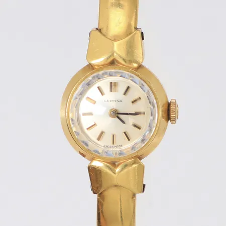 Damur Certina 18K, manuell, 17,6mm, boettnr 0810 229 466211, integrerat stelt armband 18K, bruttovikt 19,3g