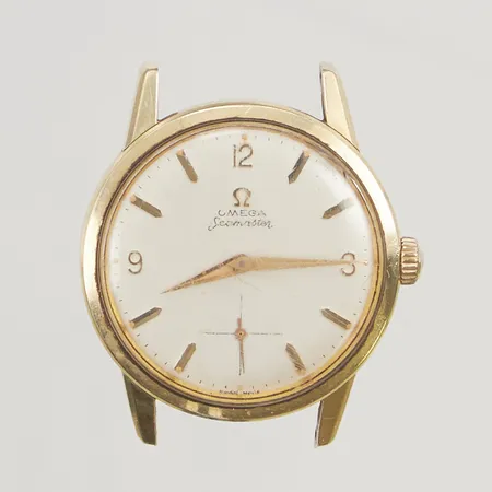 Herrur Omega Seamaster, 35mm guld på stål, manuell. 