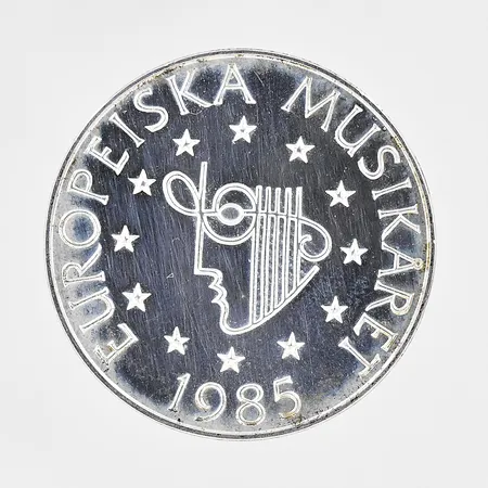 Minnesmynt Europeiska musikåret 1985 Ø 32mm nominellt värde 100kr plastetui silver 925/1000 Vikt: 16 g