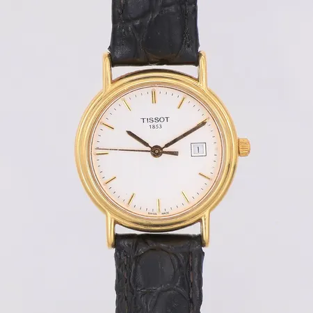 Damur Tissot 1853 18K quartz Ø25,5mm, datum, slitet armband i läder längd 19cm bredd 11mm, yrkesgravyr, står still, inga tillbehör