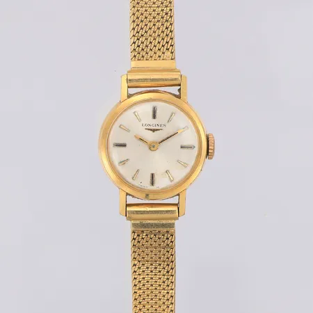 Damur Longines 18K manuell Ø18,3mm, armband 18K längd 14cm bredd 7mm, står still, repigt plastglas, inga tillbehör, bruttovikt 21,8g