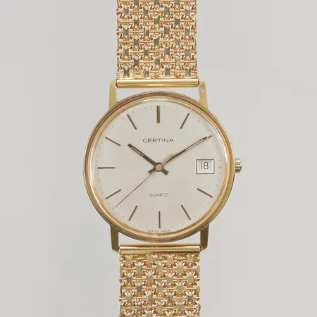 Herrur Certina quartz 33,5mm går ej, graverad 18K i ur och X-länk med stav längd:19,5cm, bredd:18mm bruttovikt 53,9g Vikt: 53,9 g