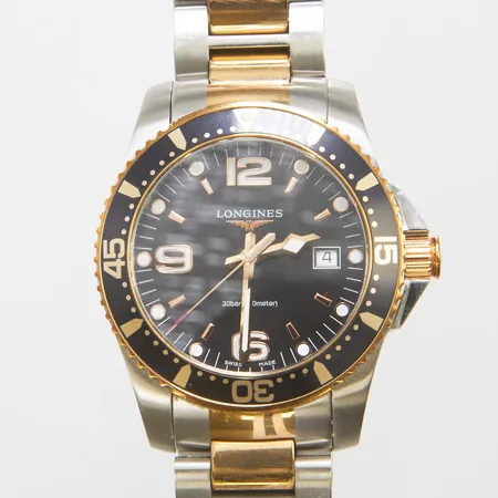 Herrur Logines Black Hydroconquest, roséguldstonat stål, quartz, 41mm, refnr L3.740.3.58.7, serienr 47363894, stållänk i roséguldstonat stål, extra länkbitar, viklås, garantikort samt kvitto Krons 2020, manual, box, ytterkartong. Vikt: 0 g