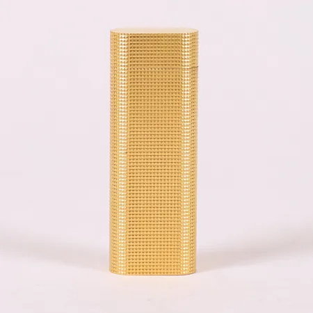 Tändare Les Must de Cartier Paris, snr: # 84257G, i gulmetall med etui, instruktionsbok samt certifikat (ej ifyllt), ej funktionstestad