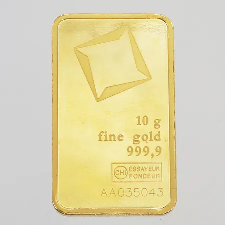 Guldtacka Valcambi Suisse snr AA035043, längd 25mm, bredd 15mm, uppklippt plastetui, 24K Vikt: 10 g