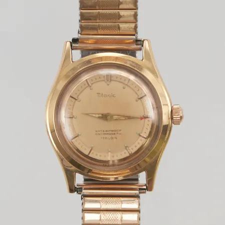 Herrur Titanic manuell 33mm, 18K, flexband