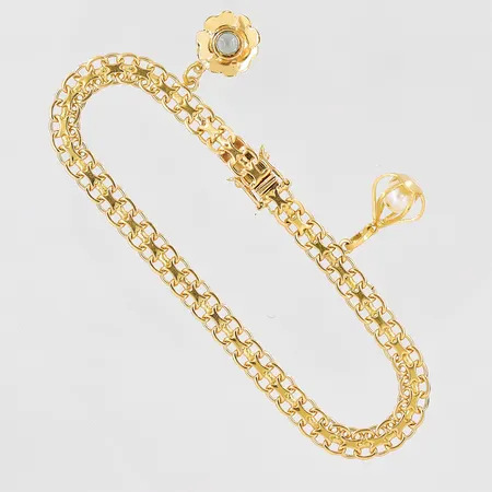 Armband X-länk längd 19cm bredd 5,5mm 2 berlocker 18K Vikt: 11 g