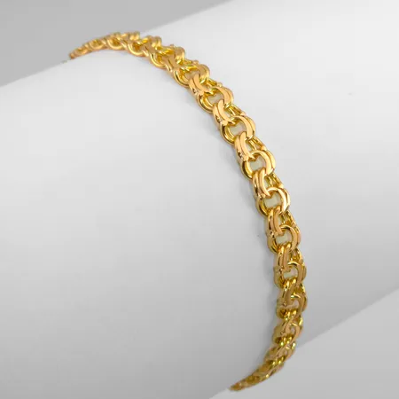 Armband Bismarck i 18K guld, N S E Guldvaru Aktiebolag, svensk kontrollstämpel, längd knäppt 19,5 cm, bredd 5 mm, fint skick Vikt: 11,4 g