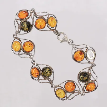 Armband med bakeliter längd 19,5cm, bredd 17mm, saknar en bakelit, 925/1000 silver Vikt: 13,8 g