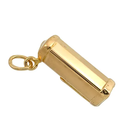 Berlock i 18K guld, längd inkl. ögla 22 mm, bredd 6 mm Vikt: 1,7 g