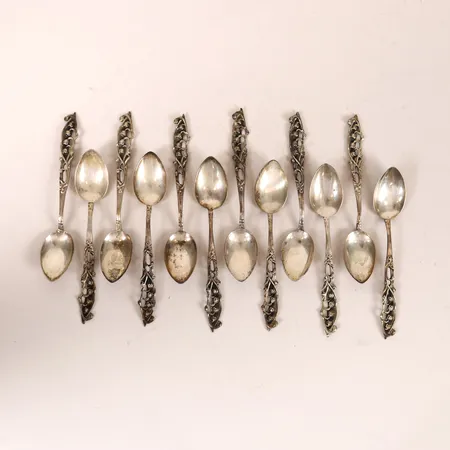 Tolv skedar längd 10,5cm, silver 830/1000 Vikt: 111,2 g
