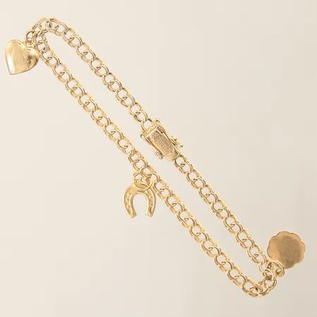 Armband Bismarck med tre integrerade berlocker längd 19cm bredd 4-20mm 18K  Vikt: 6,4 g