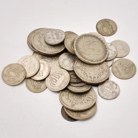 Diverse mynt i silver, 400/1000, vikt: 91,49g.