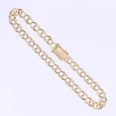 Armband Bismarck GHA längd 19cm bredd 5,5mm kistlås svenska stämplar 18K Vikt: 8,7 g