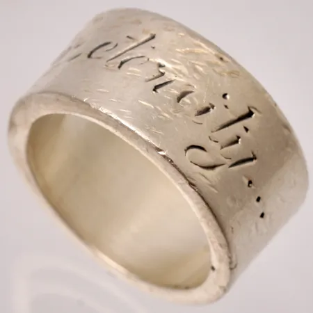 Ring stl:20 bredd 11,7mm, Efva Attling "From Here To Eternity" silver 925/1000, repor, 18,4g.