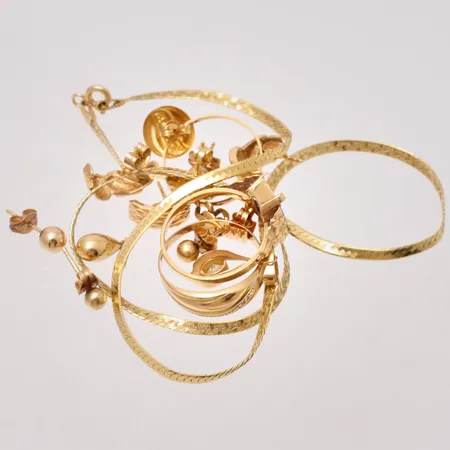 Diverse defekt guld, 18K, 15,94g.