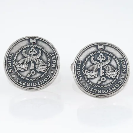 Manschettknappar JERN CONTORETS SIGILL 1747-1997 i silver. Motiven är Ø 20,4 mm. 24,8g 925/1000.