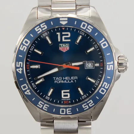 Herrur Tag Heuer Formula 1, stål, quartz, ref-nr: WAZ1010, serie-nr: BEU1510, Ø43mm, safirglas, datum, stållänk, viklås, total längd ca 17cm, 3 extra länkbitar, manual, certifikat 2023, box, ytterkartong, repor, repigt viklås