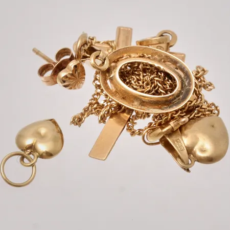 Diverse defekt guld, 18K, 5,31g.