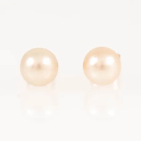 Örhängen cremevita odlade saltvattenpärlor Ø6,5mm, 18K bruttovikt 1,4g.