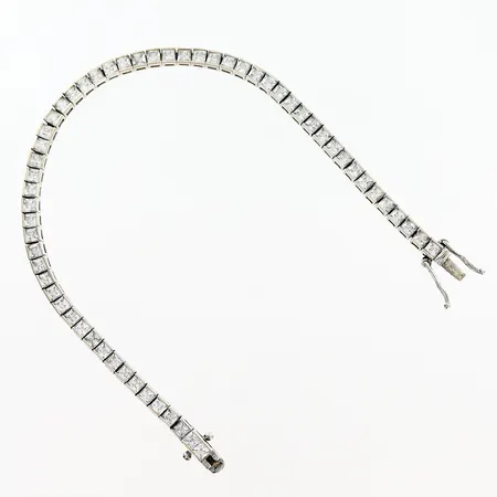Armband längd 17cm bredd 3mm vita stenar, skevheter, vitguld 18K Vikt: 9,7 g