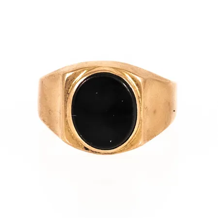 Klackring i 18K guld med en svart sten (nött). Stl:21½. Bredd 3,8 - 14 mm. bucklor. Vikt 4,5g Vikt: 4,5 g