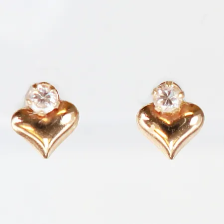 Ett par örhängen med vit sten 5x4mm, GHA, mindre skevheter,18K Vikt: 0,4 g