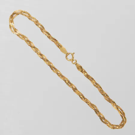 Armband flätad längd 18,5cm, bredd 3mm, ojämnheter, 18K Vikt: 2,3 g