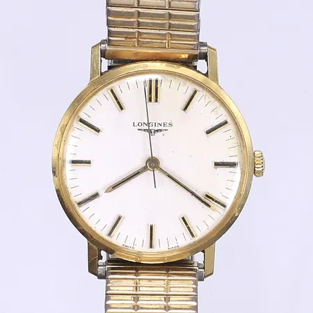 Herrur Longines manuell Ø34 18K i boett inga tillbehör hårt bruksslitage gravyr