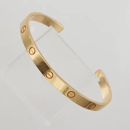 Armring Cartier "Cuff Love" open cuff size 20, ca 65x50mm, bredd 6mm, serienummer VV6947, repor, certifikat, box. 18K Vikt: 27,2 g