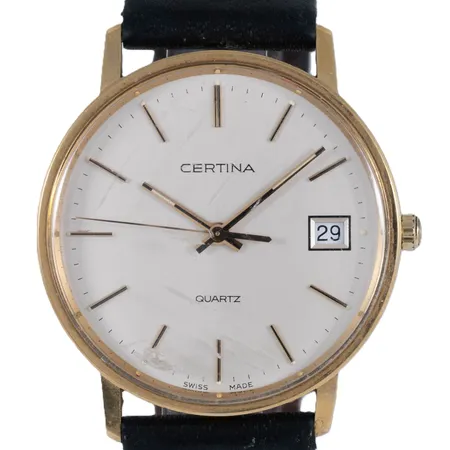 Defekt herrur Certina 18K med defekt band. Boett Ø 33,5 mm. Personlig gravyr. Quartz- går ej.