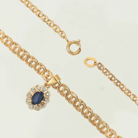 Halsband doserad Bismarck längd 47cm bredd 2,5-4mm, dåligt lagad och saknar en låsögla, Hänge med stenar, saknar en sten, allt 18K 10,4g
