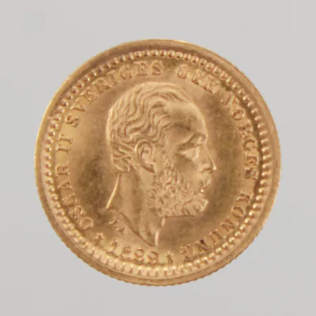 2 Guldmynt Oscar II Sverige och Norges Konung 1899, 5 kronor, plastficka,  21,6K  Vikt: 4,5 g