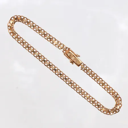 Armband x-länk, längd 19cm, bredd 4,7mm, 18K. Vikt: 5,8 g
