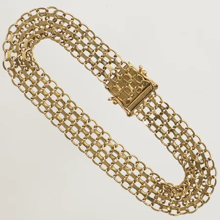 Armband X-länk 19,3mm bredd 10mm tillverkad av Ustav B år 1967 något ojämna länkdelar 18K Vikt: 11,9 g