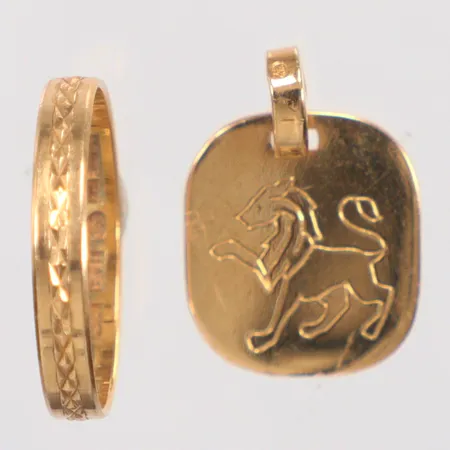 Ring stl:18 gravyr , hänge gravyr 18k Vikt: 3,8 g