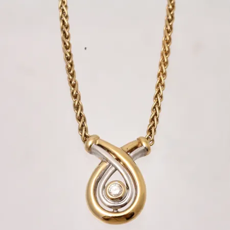 Collier i 18K guld med diamant ca 0,05ct, 43cm, Cordell, bredd ca 1,40mm, hängets mått ca 16x11mm, tillverkad av Guldfynd, 8,47g. 