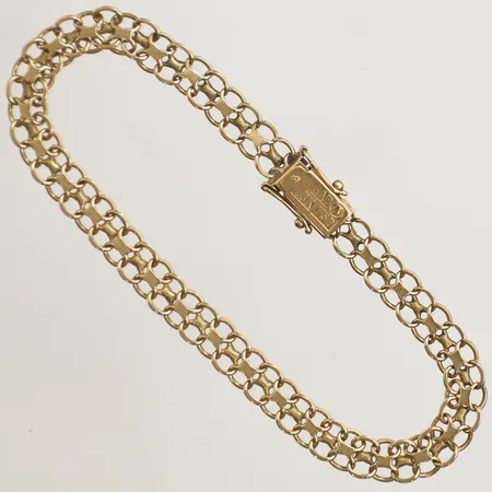 Armband X-länk längd 21cm, bredd 6,4mm 18K Vikt: 9,7 g