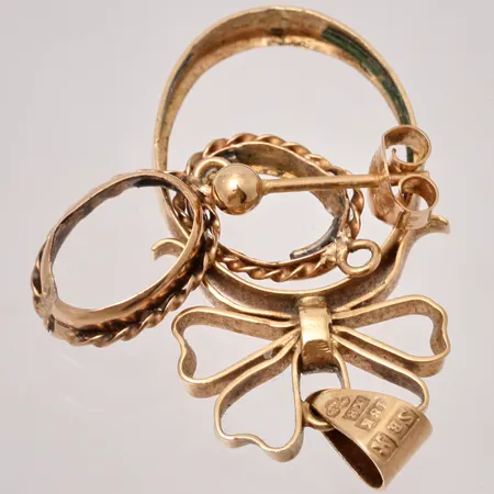 Diverse guld defekt 18K Vikt: 3,67g. 